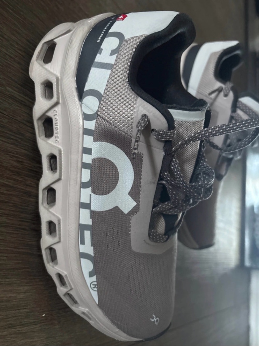 On Running women’s Cloud tech Athletic Shoe in Grey and Black